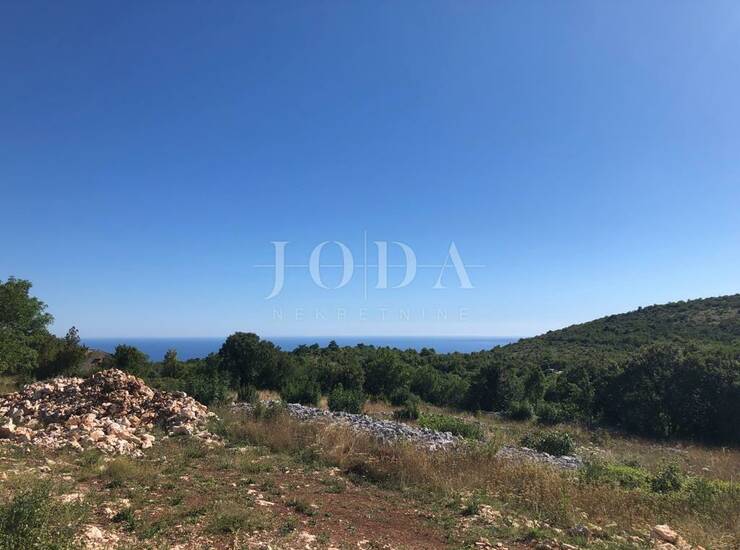 Labin, okolica, zemljište sa građevinskom dozvolom i pogledom na more