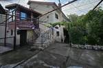 Marčelji - prodaja kuće s 2 stana, okućnicom i garažom