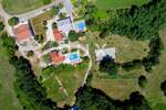 ISTRA, ŽMINJ – Imanje na 9.032 m², tri samostojeće kuće, dva bazena