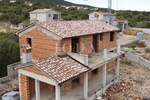 Labin, okolica, kuća u izgradnji s pogledom na more