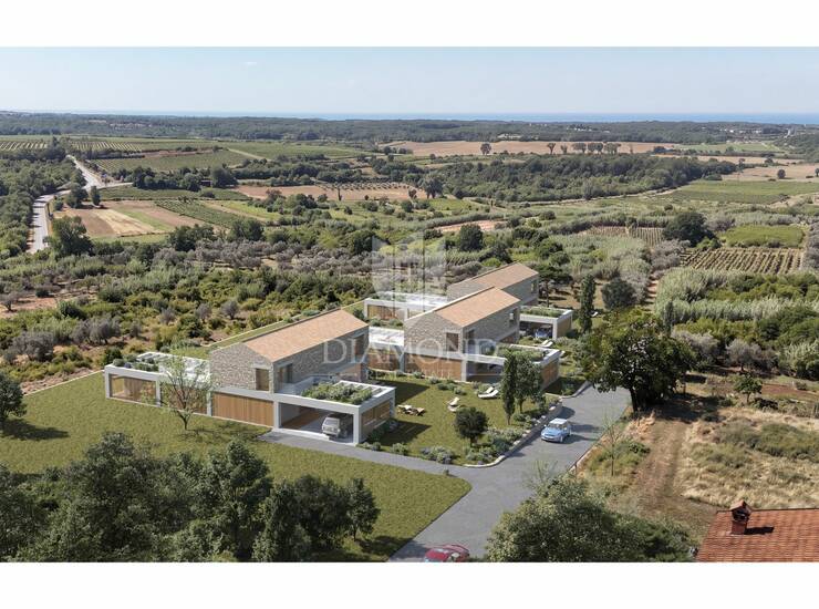 Buje! Lijepo zemljište sa projektom i pogledom na more!