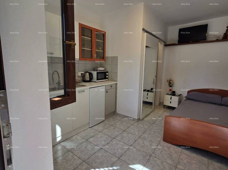 Iznajmljuje se funkcionalna garsonijera površine 20 m² smještena u prize... — fotografija 2
