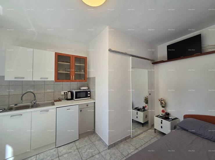 Iznajmljuje se funkcionalna garsonijera površine 20 m² smještena u prize... — fotografija 3