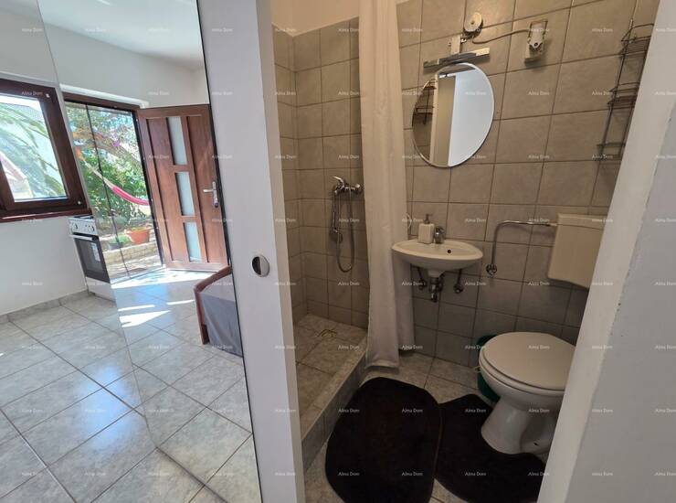 Iznajmljuje se funkcionalna garsonijera površine 20 m² smještena u prize... — fotografija 6