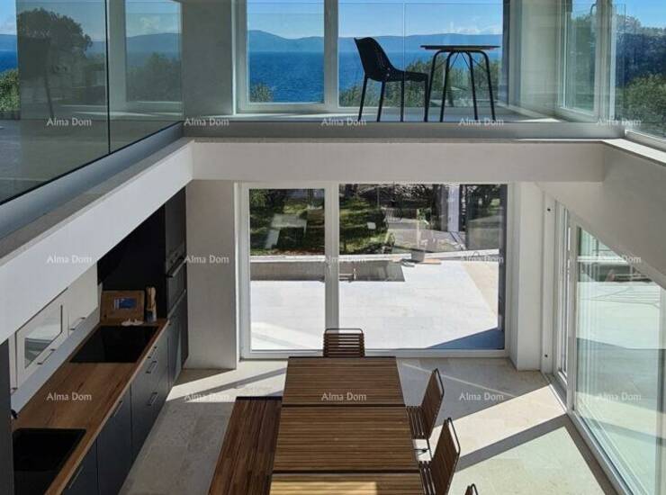 Vila suvremenog stila, ukupne površine 200 m². 
Naglasak na velikim stakl... — fotografija 3