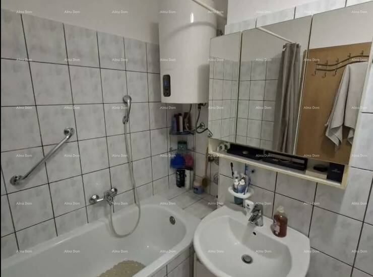 Na prodaju je renoviran i kompletno opremljen stan površine 72 m², smješ... — fotografija 9