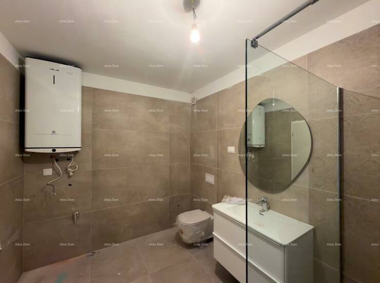 Prodajemo stan A1 u novoj zgradi koji ima 87 m2 te mu pripdaju dva garažna... — fotografija 4