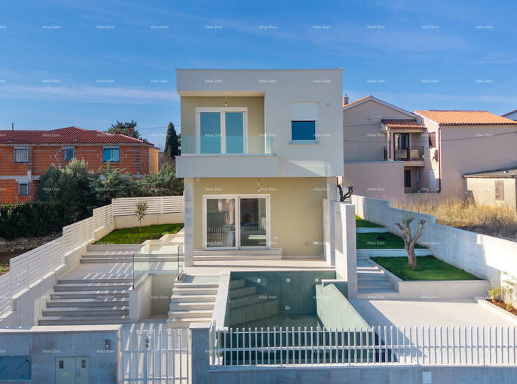 Na prodaju je moderna obiteljska kuća neto površine 177 m², smještena n...