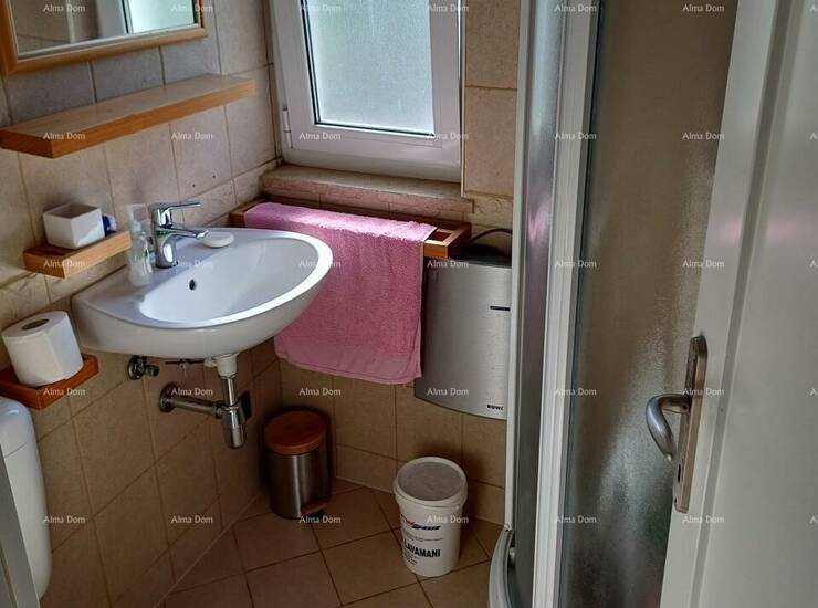 Prodaje se stan od 89 m2, Buje. Stambena površina je 69 m2, a tu je i vlas... — fotografija 9