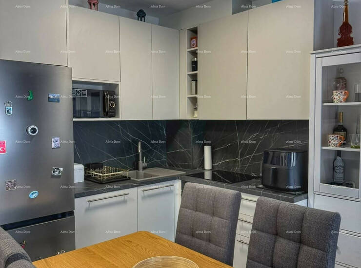 Na prodaju je lijepo uređen i namješten stan površine 40,7 m², smješte... — fotografija 8